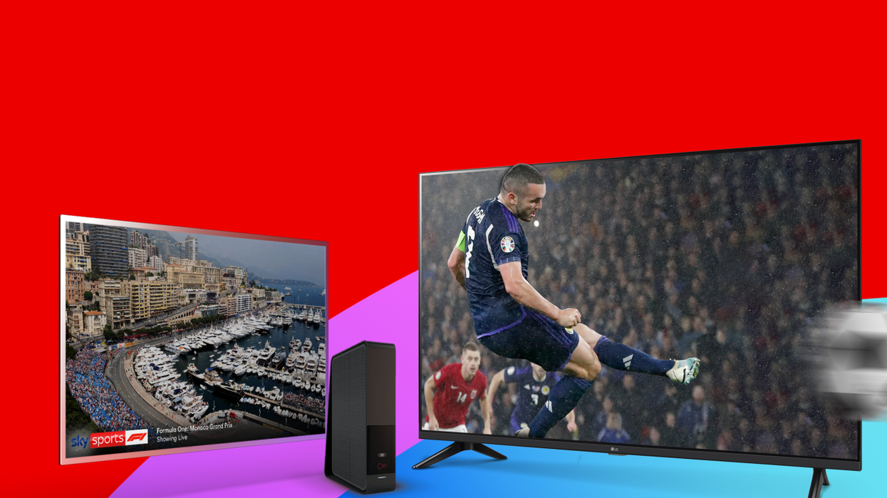 two televisions showing Sky Sports HD with a Virgin Media Wi-Fi router in the centre