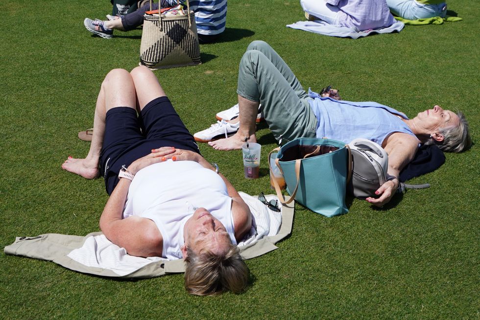 Two women sunbathing