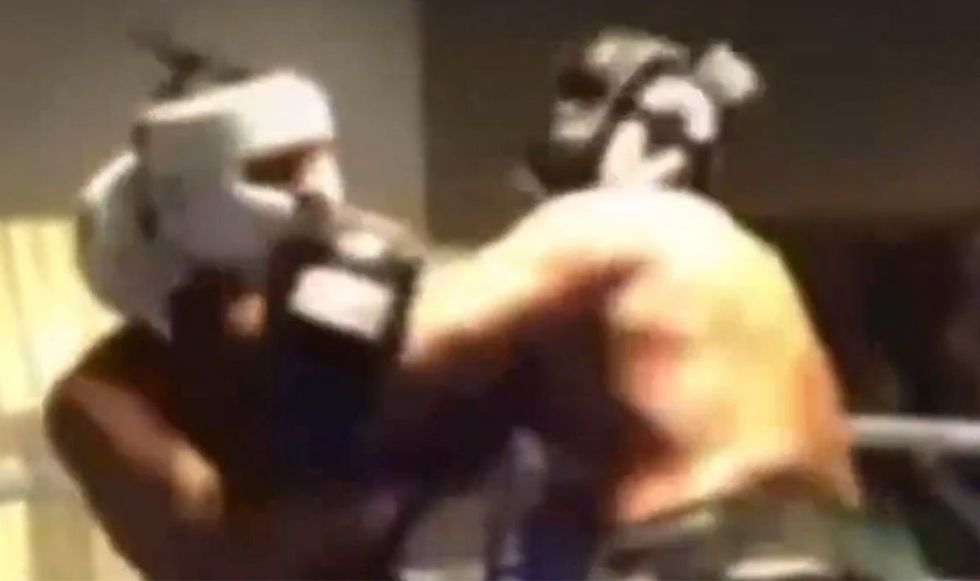 Tyson Fury's head knocked back after being hit by an elbow