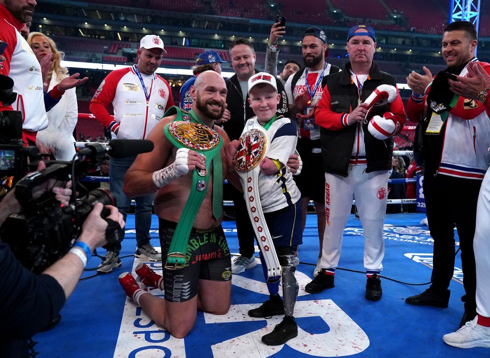Tyson Fury speaks with Marshall Janson following victory over Dillian Whyte at Wembley Stadium, London. Picture date: Saturday April 23, 2022.