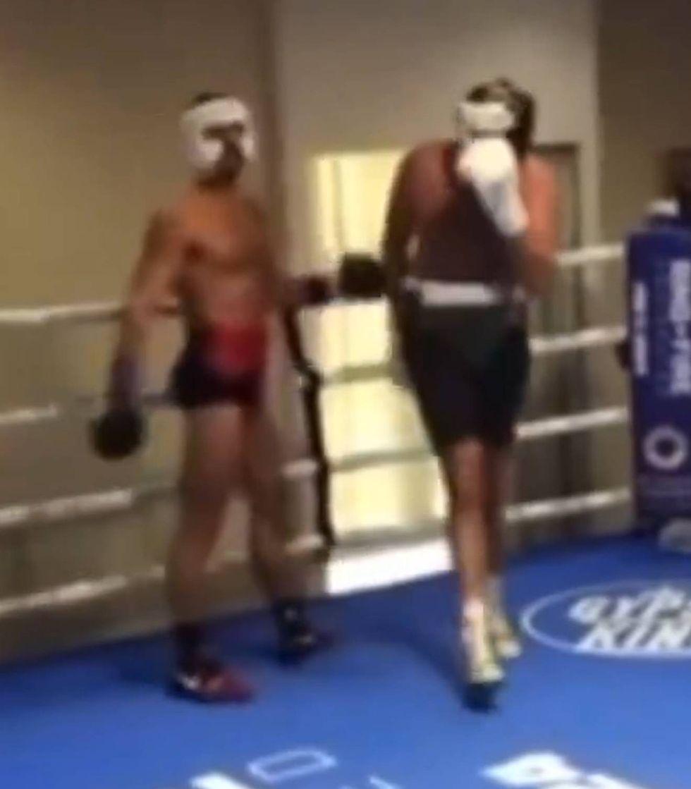 Tyson Fury walked away and touched his head after the clash