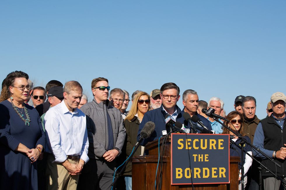 U.S. House Speaker Mike Johnson takes questions following a press conference criticizing the Biden administration's immigration policies