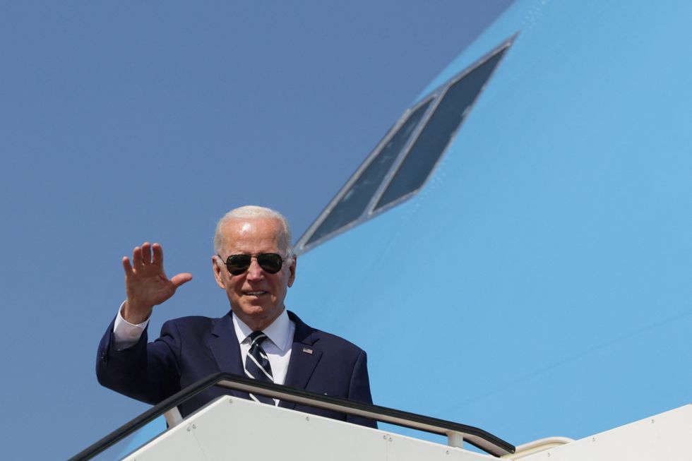U.S. President Joe Biden boards Air Force One at Ben Gurion International Airport in Lod, near Tel Aviv, Israel, July 15, 2022. REUTERS/Evelyn Hockstein