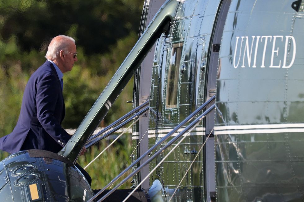 U.S. President Joe Biden boards Marine One at Gordons Pond in Rehoboth Beach, Delaware, U.S.