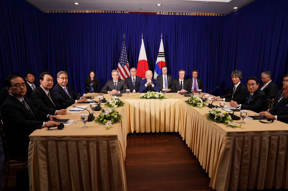 U.S. President Joe Biden holds a trilateral meeting with Japanese Prime Minister Fumio Kishida and South Korean President Yoon Suk-yeol in Phnom Penh, Cambodia, November 13, 2022. REUTERS/Kevin Lamarque
