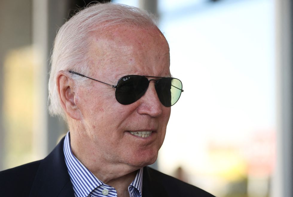 U.S. President Joe Biden speaks to media after casting his vote during early voting for the 2022 U.S. midterm elections with his granddaughter Natalie (not pictured), a first-time voter, at a polling station in Wilmington, Delaware, U.S. October 29, 2022. REUTERS/Tasos Katopodis