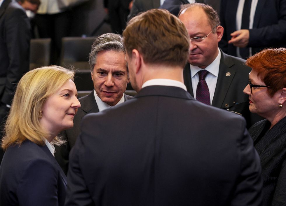 U.S. Secretary of State Antony Blinken, British Foreign Secretary Liz Truss, Lithuanian Foreign Minister Gabrielius Landsbergis, Romanian Foreign Minister Bogdan Aurescu and Australian Foreign Minister Marise Payne attend a NATO foreign ministers meeting.