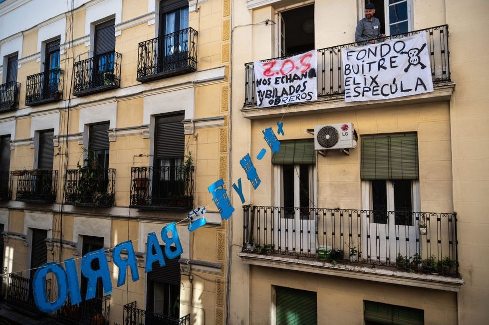 \u200b Banners against real estate speculation in houses at Tribute Street.