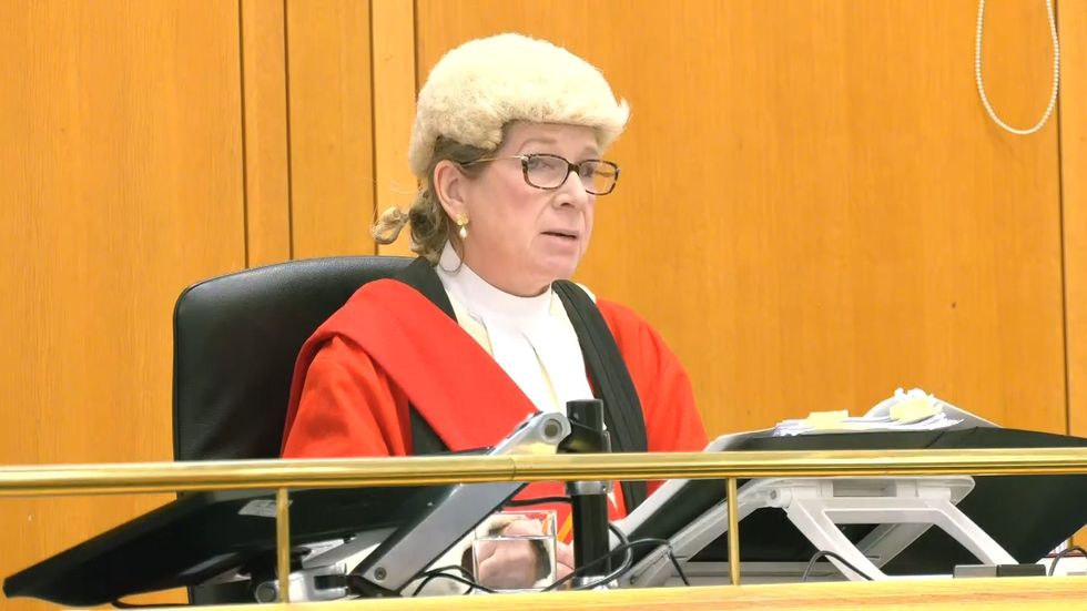 \u200b Judge Mrs Justice Lambert delivered the verdict to the two men