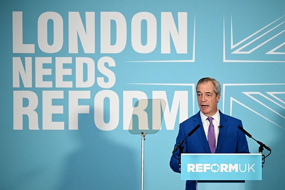 \u200b Reform UK Leader Nigel Farage speaks during a press conference at Glaziers Hall