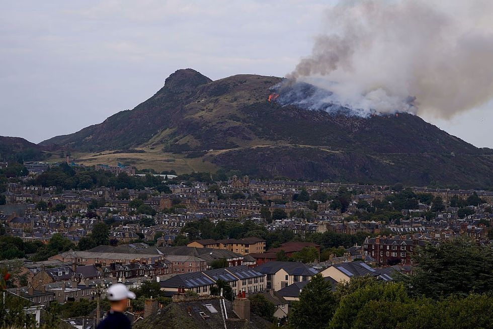 \u200b Smoke rises from a wildfire on Arthur's Seat