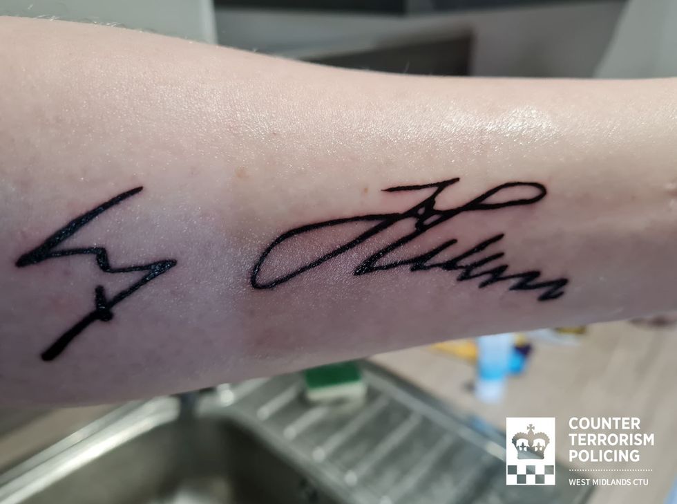 \u200b The tattoo of Adolf Hitler's signature on his left forearm of Callum Ulysses Parslow.