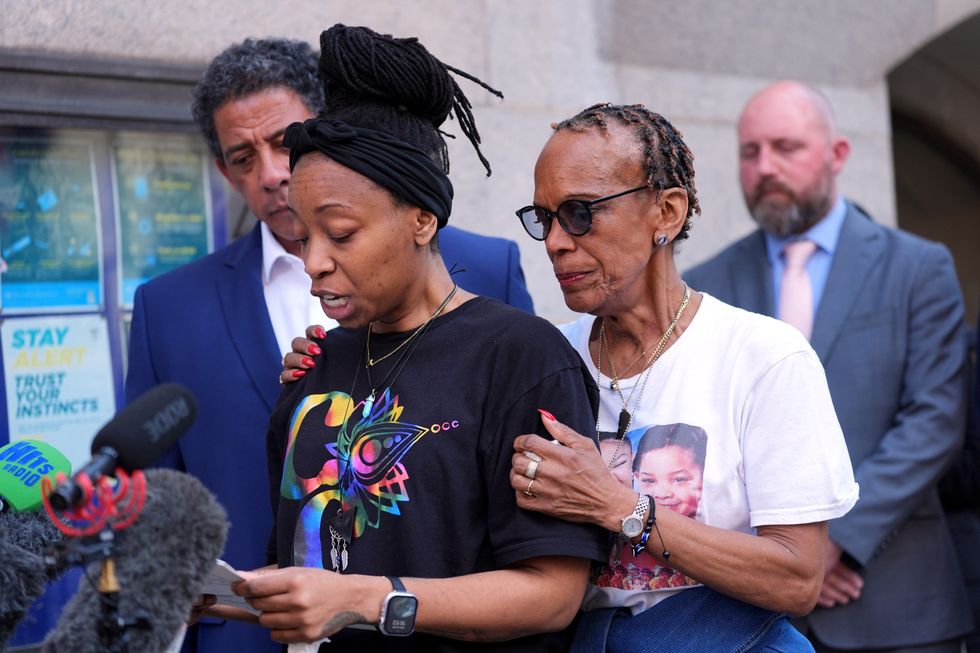 \u200b TJ Jacobs (left), is accompanied by Cher's grandmother Vyleen Maximen (right), as she speaks outside the Old Bailey, London