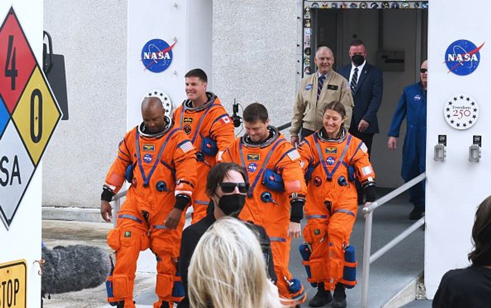 \u200b Victor Glover, Canadian Space Agency astronaut Jeremy Hansen, and NASA astronauts Reid Wiseman and Christina Koch