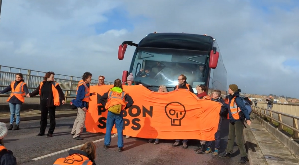 \u200b23 supporters of Just Stop Oil blocked the only road heading to the barge
