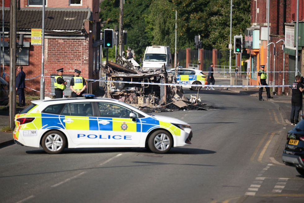 \u200bA burnt out car in Harehills