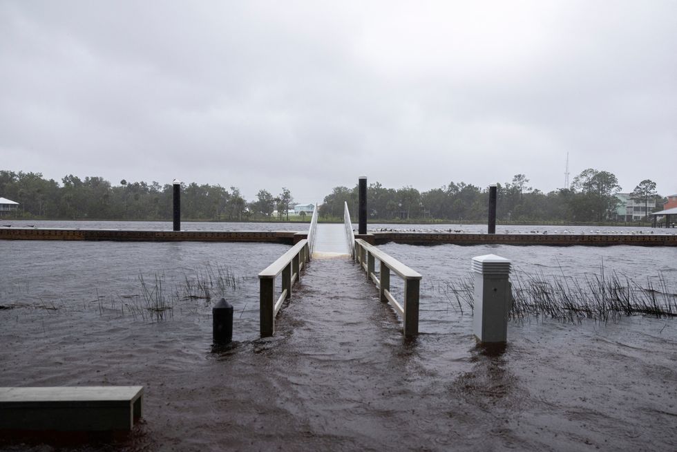 \u200bA deck partially flooded as Hurricane Debby affects the gulf coast in Keyton Beach, Florida