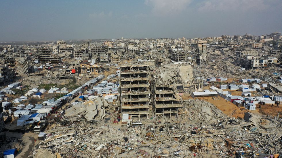 \u200bA drone view shows houses destroyed during the Israeli offensive, amid a ceasefire between Israel and Hamas, in Beit Hanoun, northern Gaza Strip