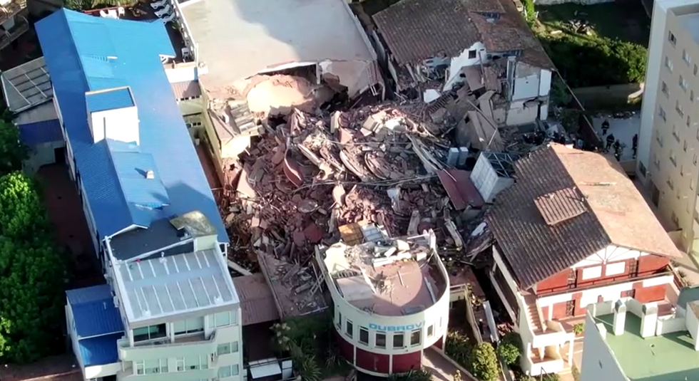 \u200bA drone view shows the remains of the hotel Dubrovnik