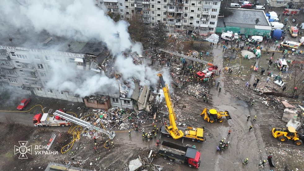 \u200bA drone view shows the site of an apartment building hit by a Russian missile strike, amid Russia's attack on Ukraine, in Poltava