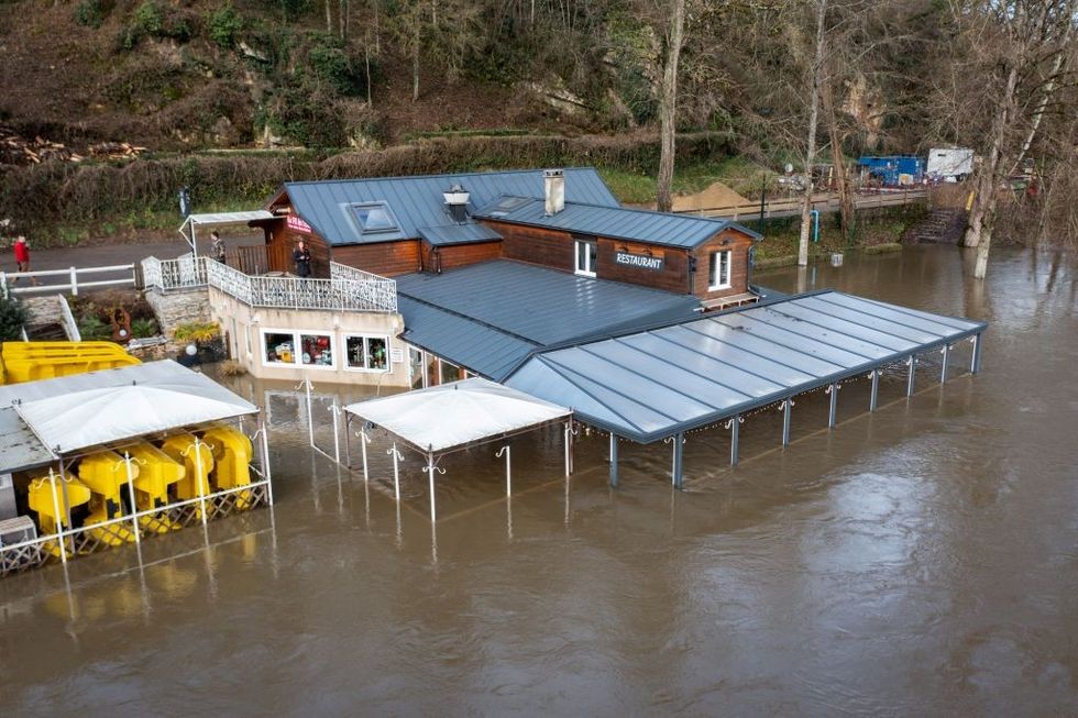 \u200bA flooded restaurant following storm Herminia, in Clecy, northwestern France