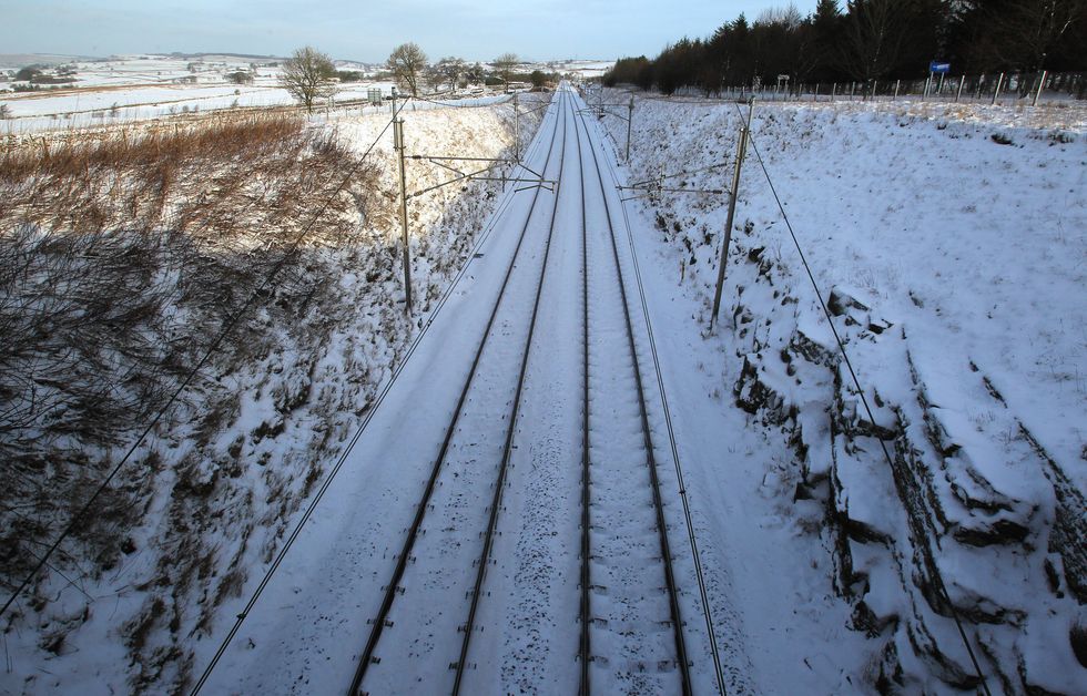 \u200bA general view of the railway lines covered in snow in Shap, Cumbria