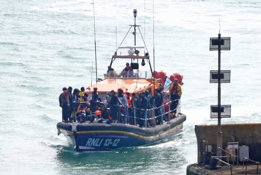 \u200bA group of people thought to be migrants are brought in to Dover, Kent,
