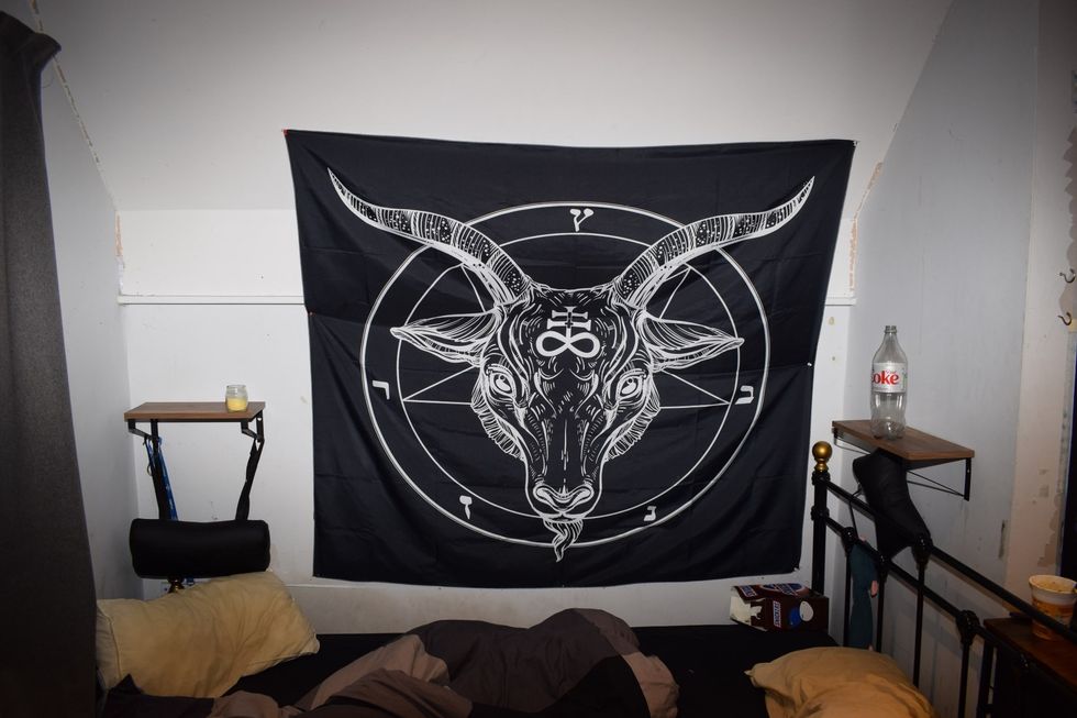 \u200bA large tapestry of the "Satanic Beast" was found