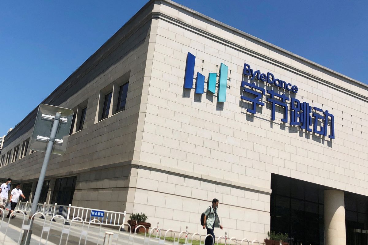 \u200ba male employee is pictured walking into the ByteDance headquarters in beijing