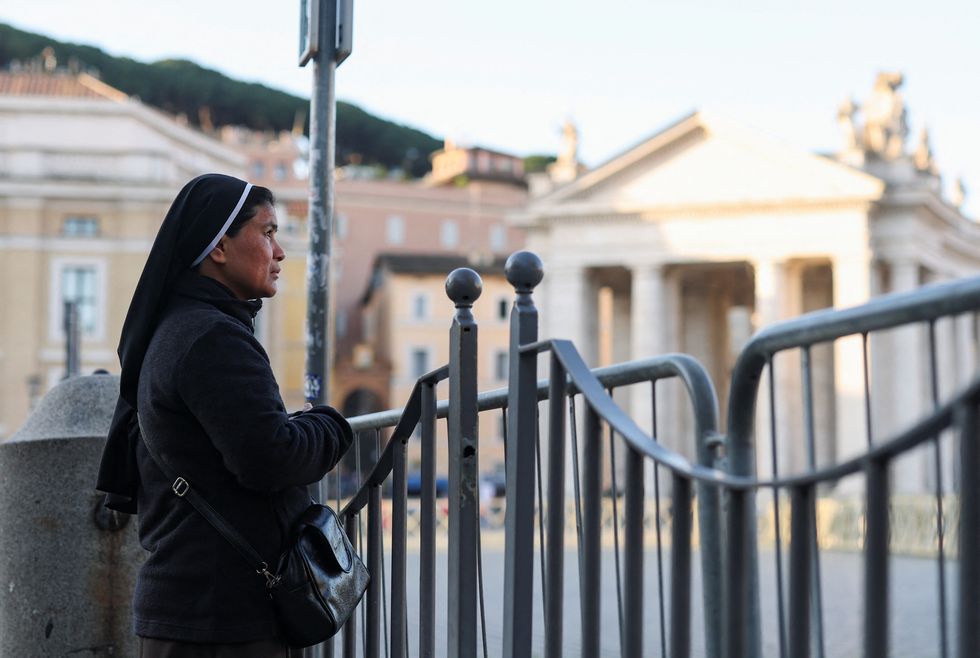 \u200bA nun looks on, following the death of Pope Francis,