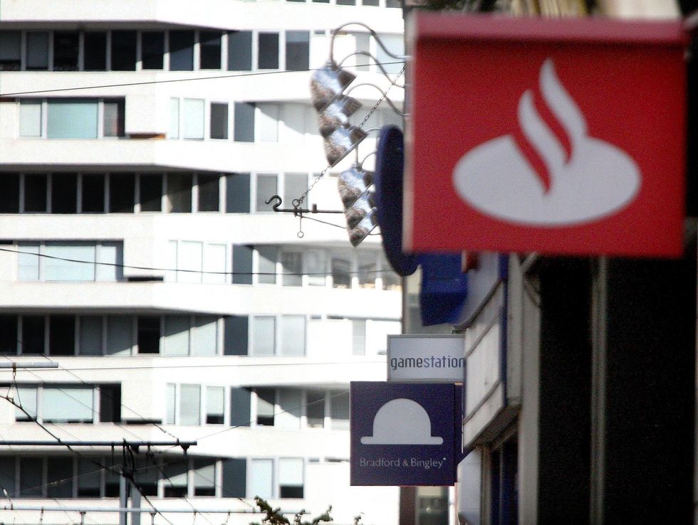 \u200bA pair of Bradford and Bingley and Abbey Bank signs