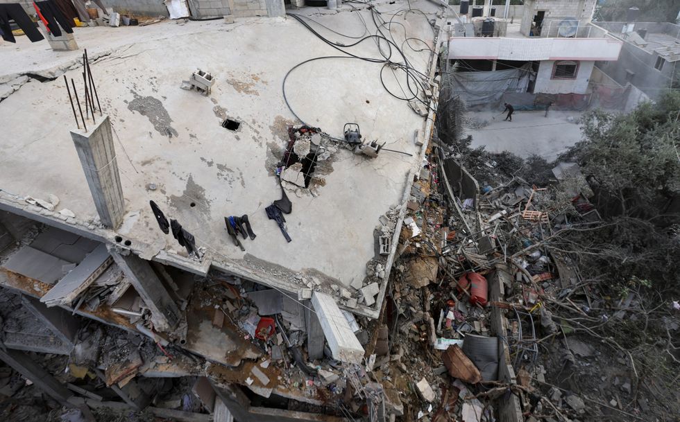 \u200bA Palestinian house hit in an Israeli strike lies in ruins, in the central Gaza Strip,