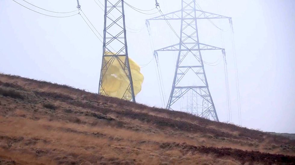 \u200bA parachute could be seen hanging off a pylon