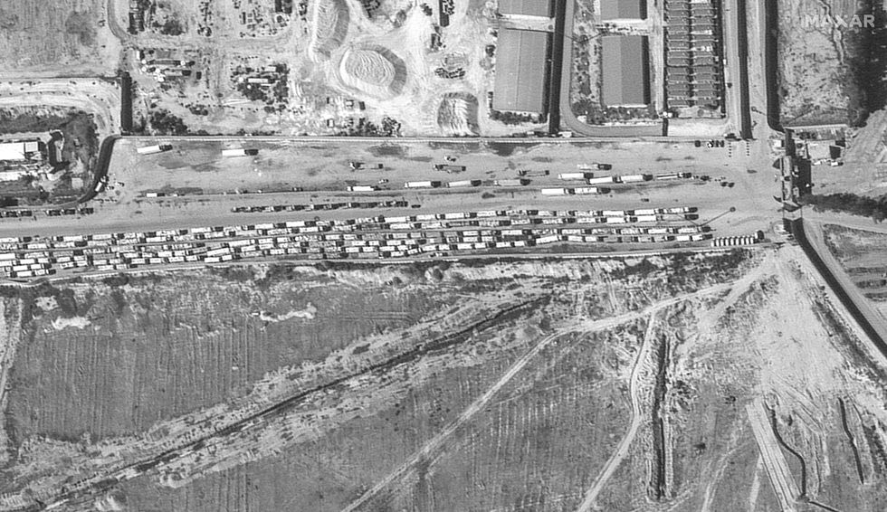 \u200bA satelite image shows trucks waiting on the Egyptian side of the Gaza-Egypt border crossing