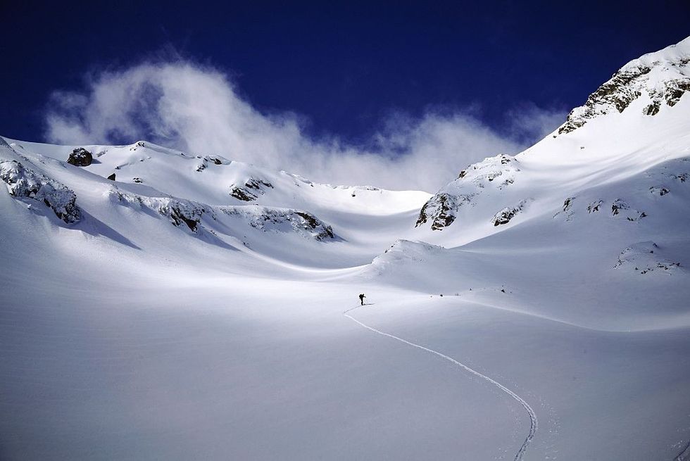 \u200bA skier enjoys the slopes of the Pirin Mountains