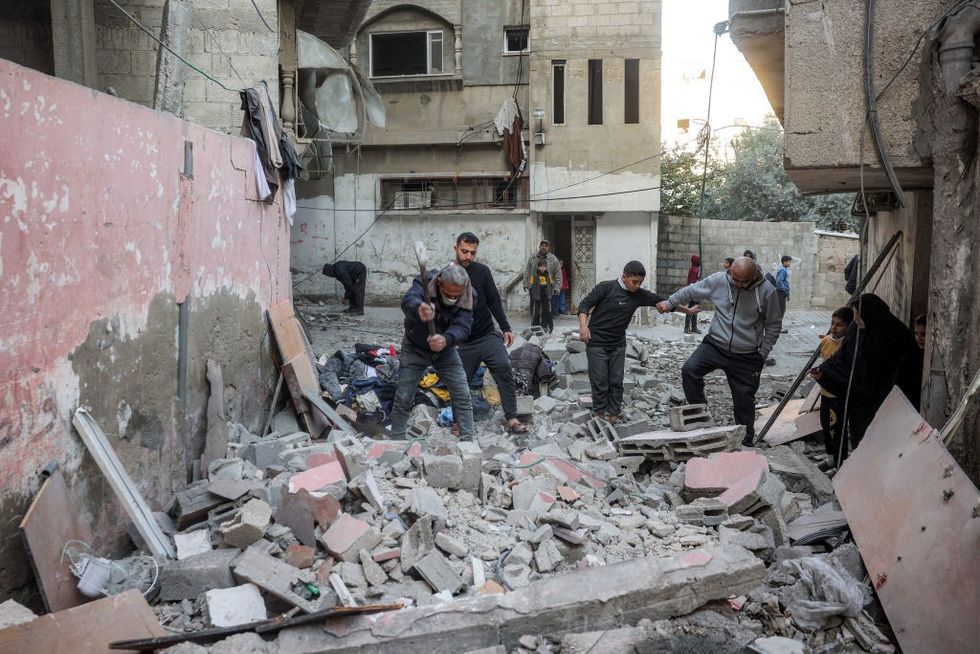 \u200ba street outside an apartment building hit by Israeli bombardment in the Bureij camp for Palestinian refugees
