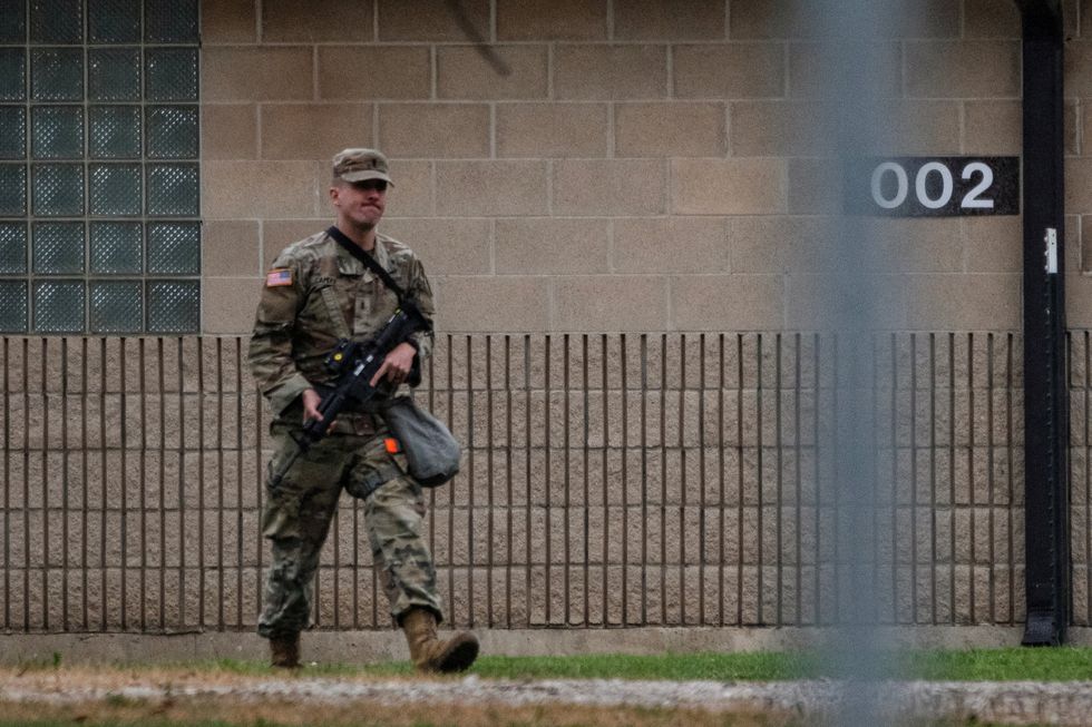\u200bA Texas Army National Guard 36th Infantry Division soldier arrives in Chicago