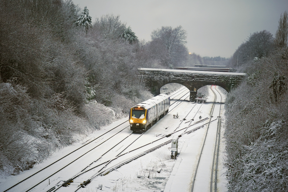 \u200bA train makes its way along the Hunt's Cross line in Liverpool
