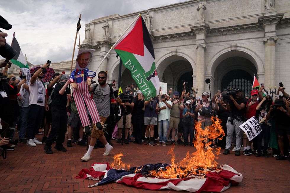\u200bA US flag burns