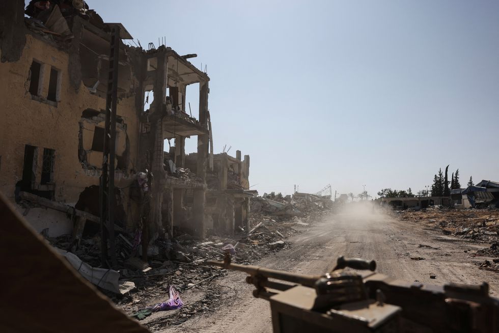 \u200bA view of a street in the Gaza Strip as it is seen from an Israeli military vehicle amid the ongoing ground operation