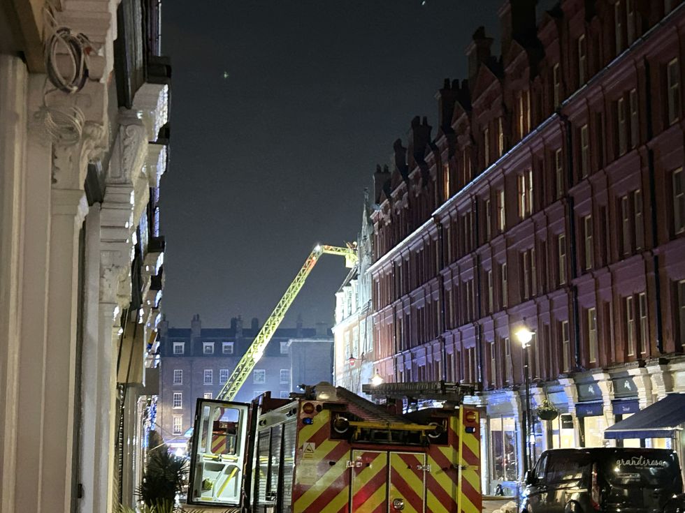 \u200bA view of the London Fire Brigade (LFB) outside the Chiltern Firehouse luxury hotel in central London