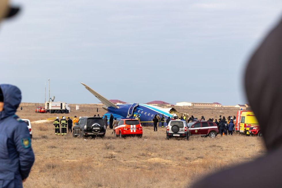 \u200bA view of the scene after an Azerbaijan Airlines flight with 67 people on board, traveling from the Azerbaijani capital Baku to Grozny in Russia's Chechnya region, crashed near the Kazakh Caspian city of Aktau