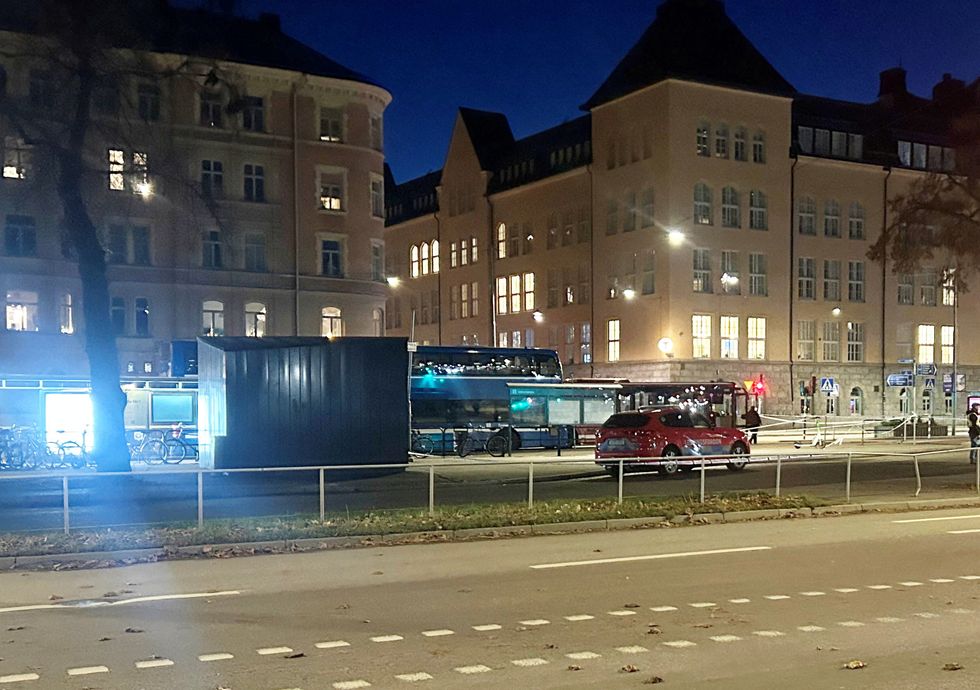 \u200bA view of the site where a bus hit a bus stop in central Stockholm, Sweden,
