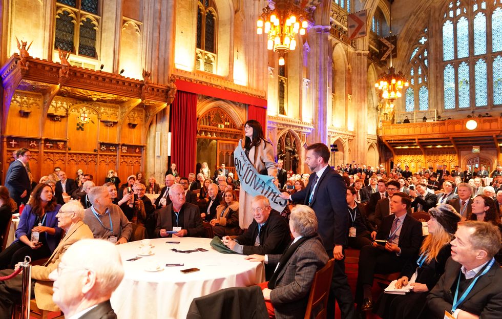 \u200bActivists from Climate Resistance protest during Conservative Party leader Kemi Badenoch's keynote speech
