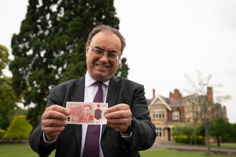 \u200bAndrew Bailey holding up a \u00a350 note