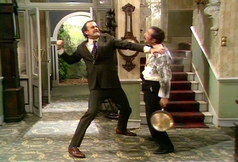 \u200bBasil in an altercation with Manuel, played by Andrew Sachs