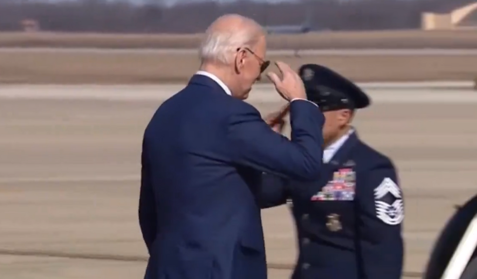 \u200bBiden saluted at military personnel as he made his way to the aircraft