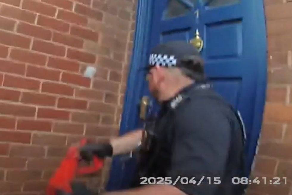 \u200bBody-worn footage shows the moment officers smashed down the door