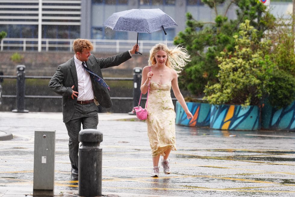 \u200bBritons running from storms and rainy weather in Newcastle