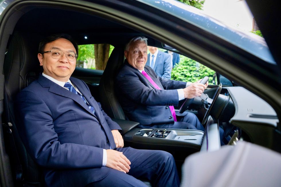 \u200bBYD Chairman Wang Chuanfu with Prime Minister of Hungary Viktor Orb\u00e1n in a BYD Sealion 7